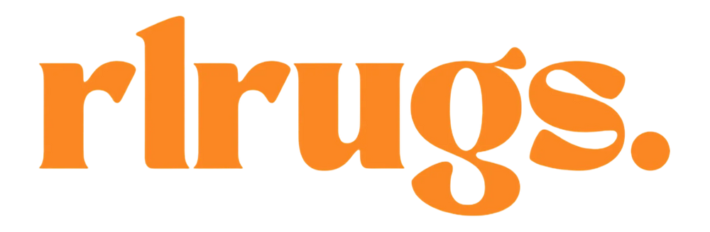 Orange stylized text logo spelling 'rlrugs' on a transparent background